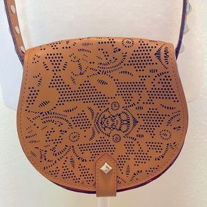 Brown leather canteen shaped crossbody purse